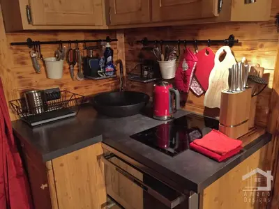 a kitchen with a sink and a counter top at 