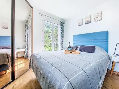 a bathroom with a washing machine and a bath tub at Apartment Les Gentianes by Interhome in Saint-Gervais-les-Bains