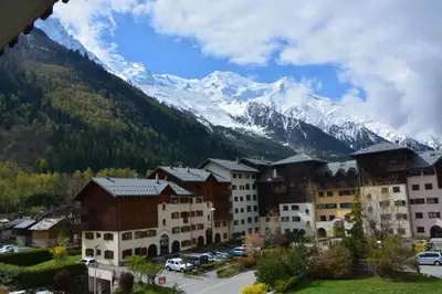 a view of a town with a mountain in the background at Appt 4 /5 pers - 3 min. centre ville in Chamonix-Mont-Blanc