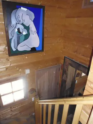 a log cabin with snow on the roof at Chambres et Mazots du Chalet de Mado in Megève