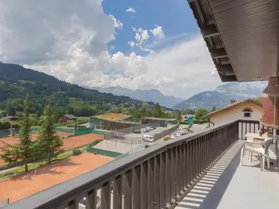 a balcony with a view of a street and mountains at Apartment Le Sarto by Interhome in Saint-Gervais-les-Bains