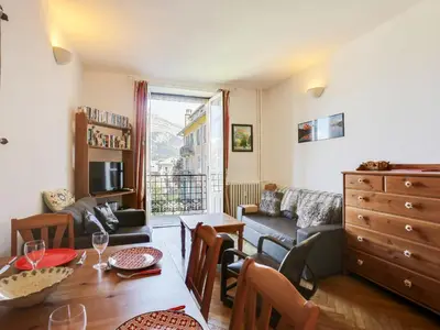 a living room with a table and a couch at Apartment La Résidence by Interhome in Saint-Gervais-les-Bains