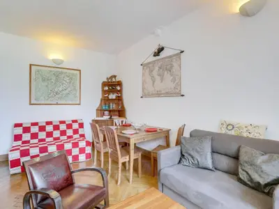 a living room with a table and a couch at Apartment La Résidence by Interhome in Saint-Gervais-les-Bains