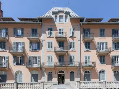a town covered in snow with mountains in the background at Apartment La Résidence by Interhome in Saint-Gervais-les-Bains