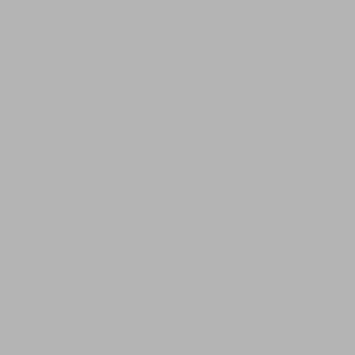 a lodge in the snow with a mountain in the background at Hôtel L'Arboisie in Megève