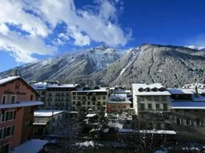 a view of a city with a mountain in the background at Appartement spacieux à Chamonix, 8 pers, ascenseur - FR-1-507-25 in Chamonix-Mont-Blanc