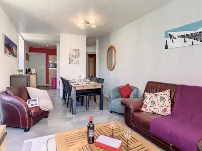 a living room with two couches and a table at Appartement spacieux à Chamonix, 8 pers, ascenseur - FR-1-507-25 in Chamonix-Mont-Blanc