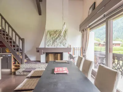 two beds in a room with a attic at Duplex 6 pers, Animaux admis, Parking, Vue Mont Blanc - FR-1-517-11 in Chamonix-Mont-Blanc