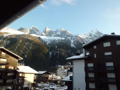 a view of the mountains from a city at Appartement à Chamonix avec Balcon, Animaux Acceptés et Parking - FR-1-517-12 in Chamonix-Mont-Blanc