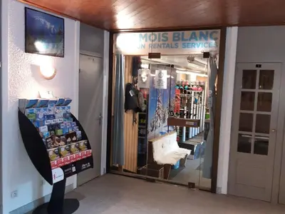 a store front of a store with a mirror at Appartement Chamonix avec accès aux domaines skiables et parking - FR-1-517-13 in Chamonix-Mont-Blanc