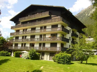 a large building with balconies on the side of it at Studio lumineux 3 pers, animaux admis, parking - FR-1-517-27 in Chamonix-Mont-Blanc