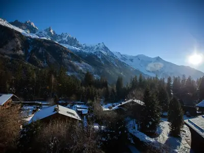 a village in the mountains with snow on the ground at Studio Charmant avec Vue Mont Blanc, Parking et Animaux Admis - FR-1-517-35 in Chamonix-Mont-Blanc
