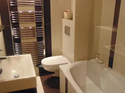 a bathroom with a toilet and a tub and a sink at Studio Charmant avec Vue Mont Blanc, Parking et Animaux Admis - FR-1-517-35 in Chamonix-Mont-Blanc