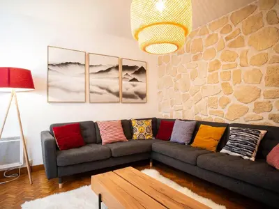 a dining room with a table and chairs at Magnifique appartement centre-ville - Animaux admis, WiFi - FR-1-517-37 in Chamonix-Mont-Blanc