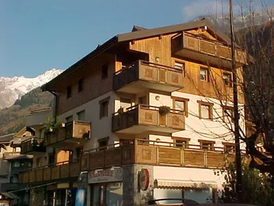a large building with balconies on the side of it at Charmant 2 Pièces Central avec Terrasse - Chamonix - FR-1-517-41 in Chamonix-Mont-Blanc