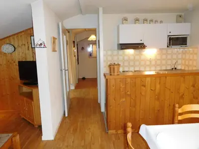 a kitchen with a sink and a counter top at Bel appartement rénové à Chamonix avec vue sur le Mont-Blanc, parking et animaux admis - FR-1-517-51 in Chamonix-Mont-Blanc