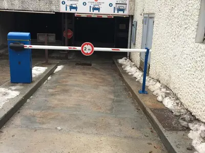 a entrance to a building with a no parking sign at Studio cosy proche des pistes - Animaux admis - FR-1-517-52 in Chamonix-Mont-Blanc
