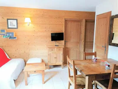 a glass shower in a kitchen with a washing machine at Appartement 3 pièces à Morillon 1100, 6 personnes, animaux admis, wifi - FR-1-815-72 in Morillon