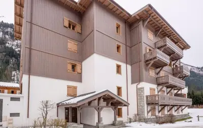 a large building with balconies on the side of it at Home sweet home in Chamonix-Mont-Blanc