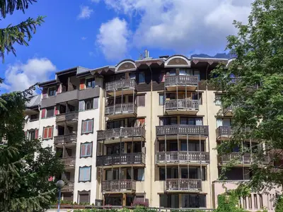 an apartment building with balconies on the side of it at Apartment Jonquilles-10 by Interhome in Chamonix-Mont-Blanc