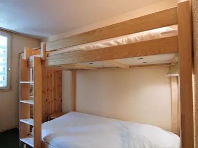 a bedroom with two bunk beds in a room at Apartment Jonquilles-10 by Interhome in Chamonix-Mont-Blanc