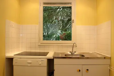 a kitchen with a sink and a window at 2 Pièces 6 Pers centre station (GV211) in Les Carroz d'Araches