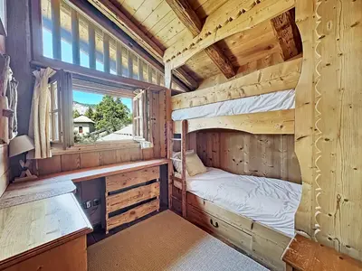 a bedroom with two bunk beds in a log cabin at - Duplex Haut Standing 6 pers (ZE101) in Les Carroz d'Araches