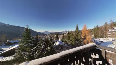 a view from a balcony with christmas trees at Duplex 4 Pers PIed de pistes (BA331) in Les Carroz d'Araches