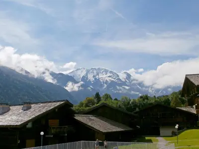 a large wooden building with two decks on it at Studio Les G'rets-10 by Interhome in Saint-Gervais-les-Bains