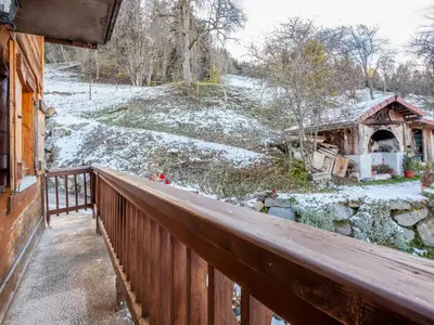 a balcony of a house with snow on the ground at Apartment A la Claire Fontaine 1 by Interhome in Mémontel
