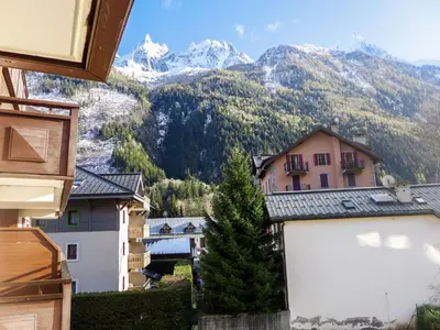 a view of a town with mountains in the background at Apartment L'Espace Montagne-15 by Interhome in Chamonix-Mont-Blanc