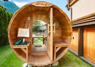 an arched window of a sauna with a hat at Chalet-Hôtel Hermitage in Chamonix-Mont-Blanc