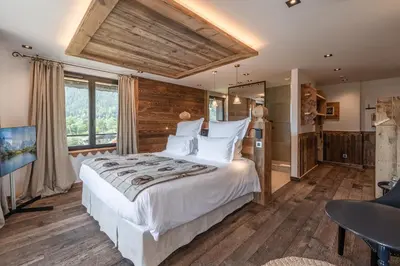 an aerial view of a resort with mountains at Chalet-Hôtel Hermitage in Chamonix-Mont-Blanc