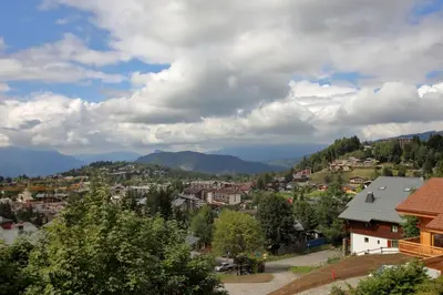a view of a small town in the mountains at AG005 - Studio coin montagne proche pistes in Les Carroz d'Araches