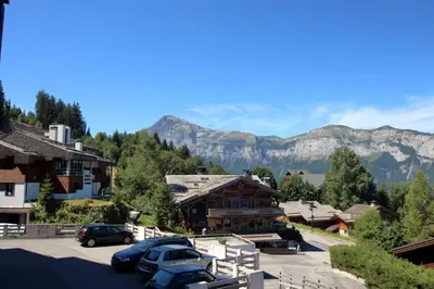 a mountain in the distance with trees in the foreground at BA112 Studio 4 Pers Pied de pistes Carroz in Les Carroz d'Araches