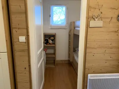 a small room with a small window and a door at CX116 - Duplex 6 pers Pied de pistes in Les Carroz d'Araches