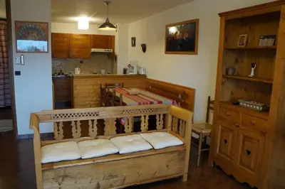 a kitchen with a wooden bench in a room at GR007 - 2 Pièces 5/6 pers centre Carroz in Les Carroz d'Araches