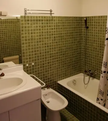 a bathroom with a sink and a tub and a toilet at GR007 - 2 Pièces 5/6 pers centre Carroz in Les Carroz d'Araches