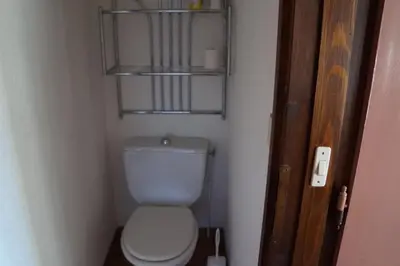 a small bathroom with a white toilet in a room at NAN01 - Studio 4 Pers Télécabine in Les Carroz d'Araches