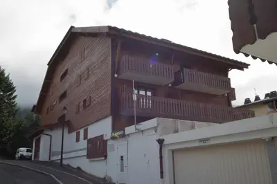a building with balconies on the side of it at RB111 - Studio 4 Pers centre Carroz in Les Carroz d'Araches