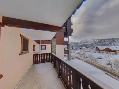 a balcony of a house with snow on the ground at SB106 - 2 Pièces 5/6 Pers centre des Carroz in Les Carroz d'Araches