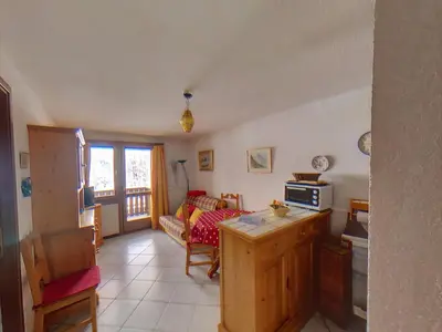 a room with a kitchen and a living room at SB106 - 2 Pièces 5/6 Pers centre des Carroz in Les Carroz d'Araches