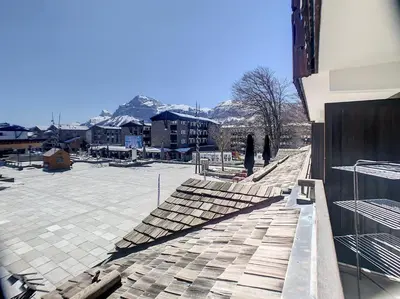 a group of people standing on the roof of a building at SL127 - 2 Pièces 4 Pers centre Carroz in Les Carroz d'Araches