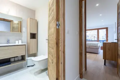 a bathroom with a toilet and a sink at Apartment Brevent Fodera in Chamonix-Mont-Blanc