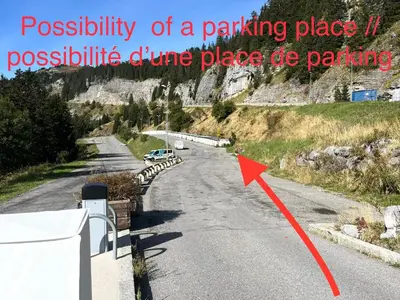 a car driving down a road with a red arrow at Flaine Forum L1 Cassiopée Mezzanine & Terrasse in Flaine