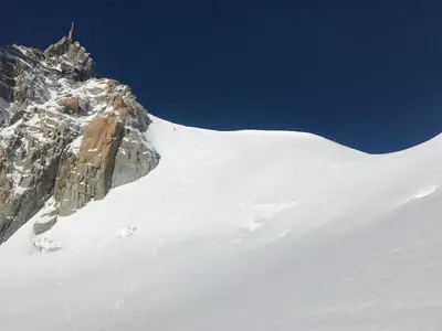 a view of a snow covered mountain at Vues incroyables - Glaciers, lacs et montagnes in Chamonix-Mont-Blanc