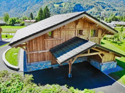 an overhead view of a house with a roof at Chalet luxe L'HIBISCUS in Samoëns