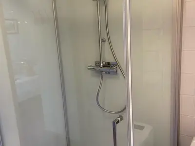 a shower with a glass door in a bathroom at Charmant Duplex 3 Chambres à 100m des Pistes, Parking, WIFI - FR-1-815-73 in Morillon