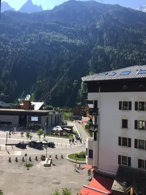 a view of a building with a mountain in the background at Le Mallory in Chamonix-Mont-Blanc