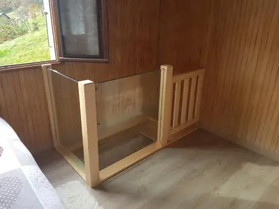 a corner of a room with a wooden wall at Chalet avec terrasse et vue sur le Mt-Blanc in Sallanches